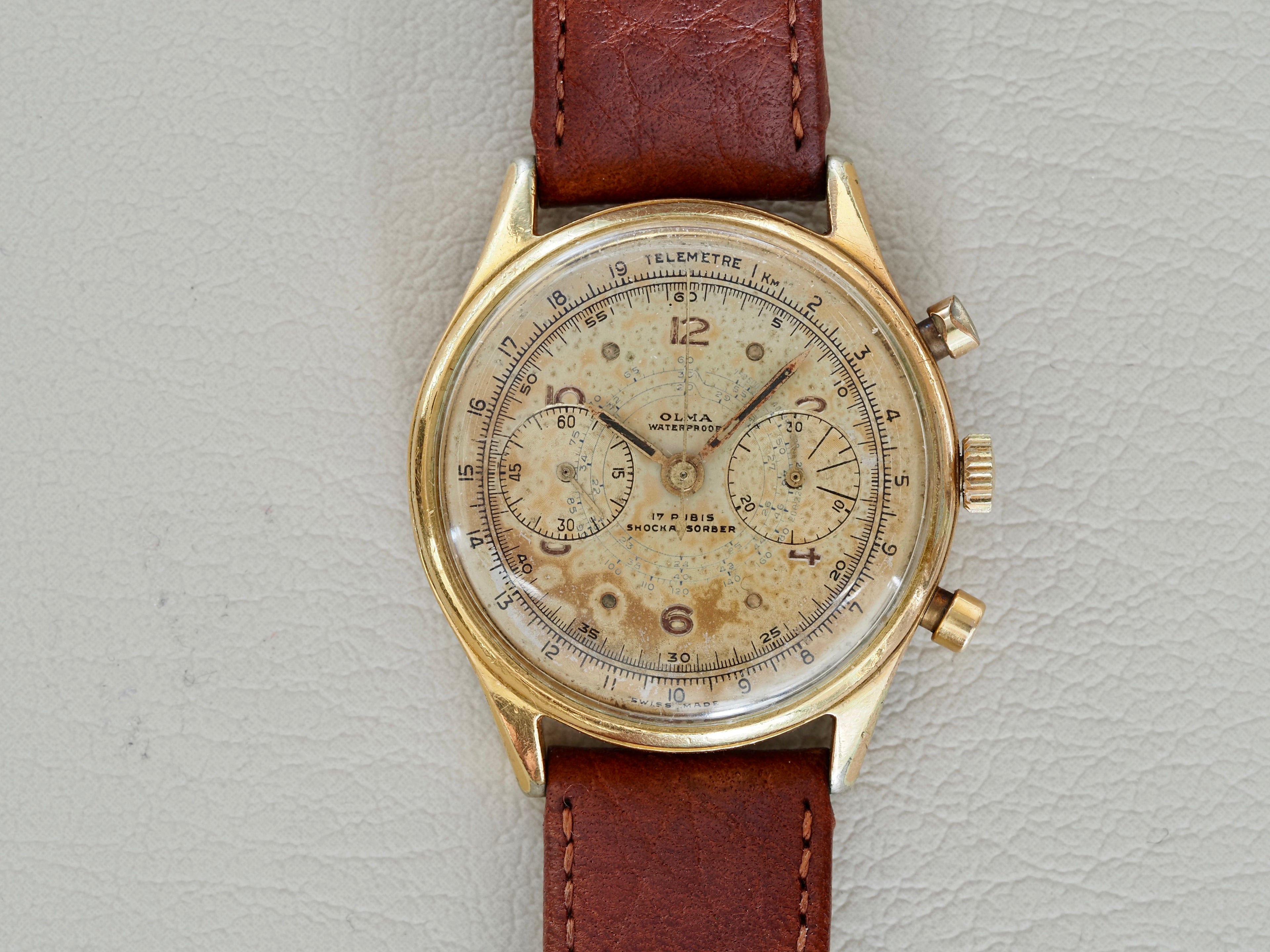 Montre vintage Olma Chronograph, pour homme, proposée par Maison Vintage Watches.