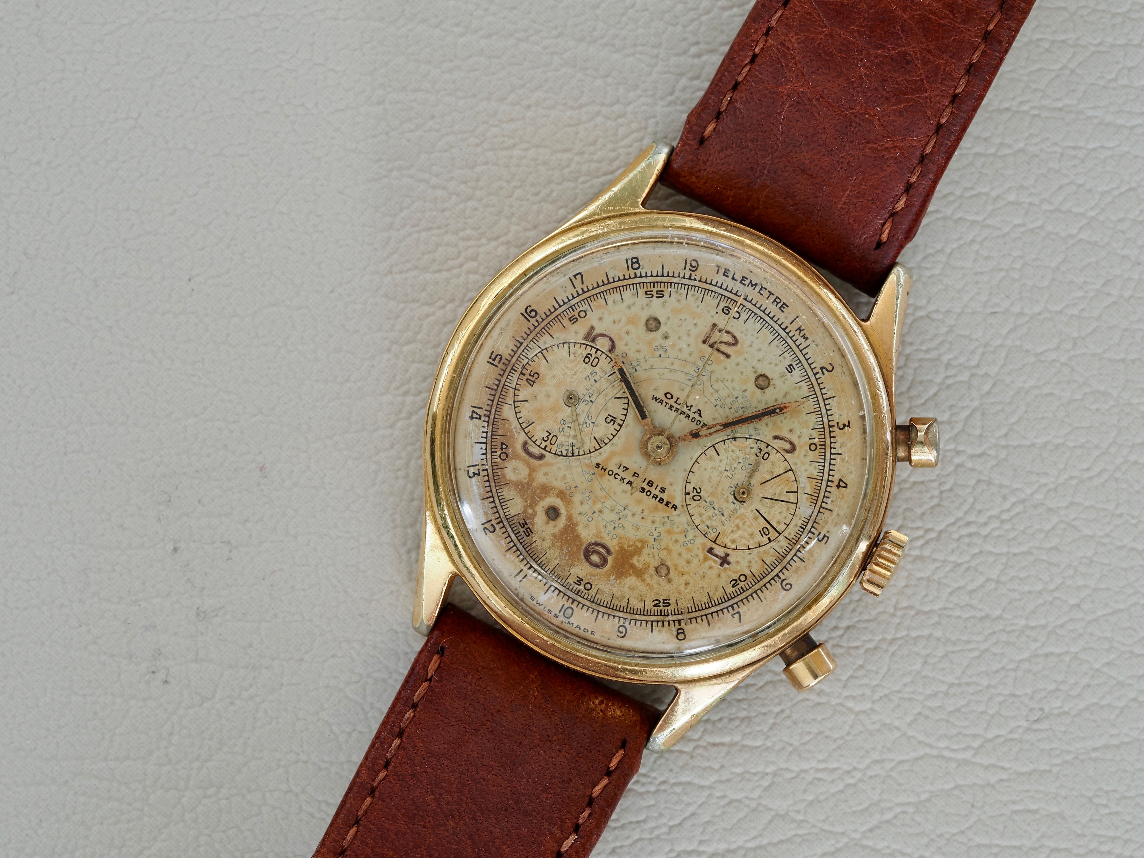 Montre vintage Olma Chronograph, pour homme, proposée par Maison Vintage Watches.