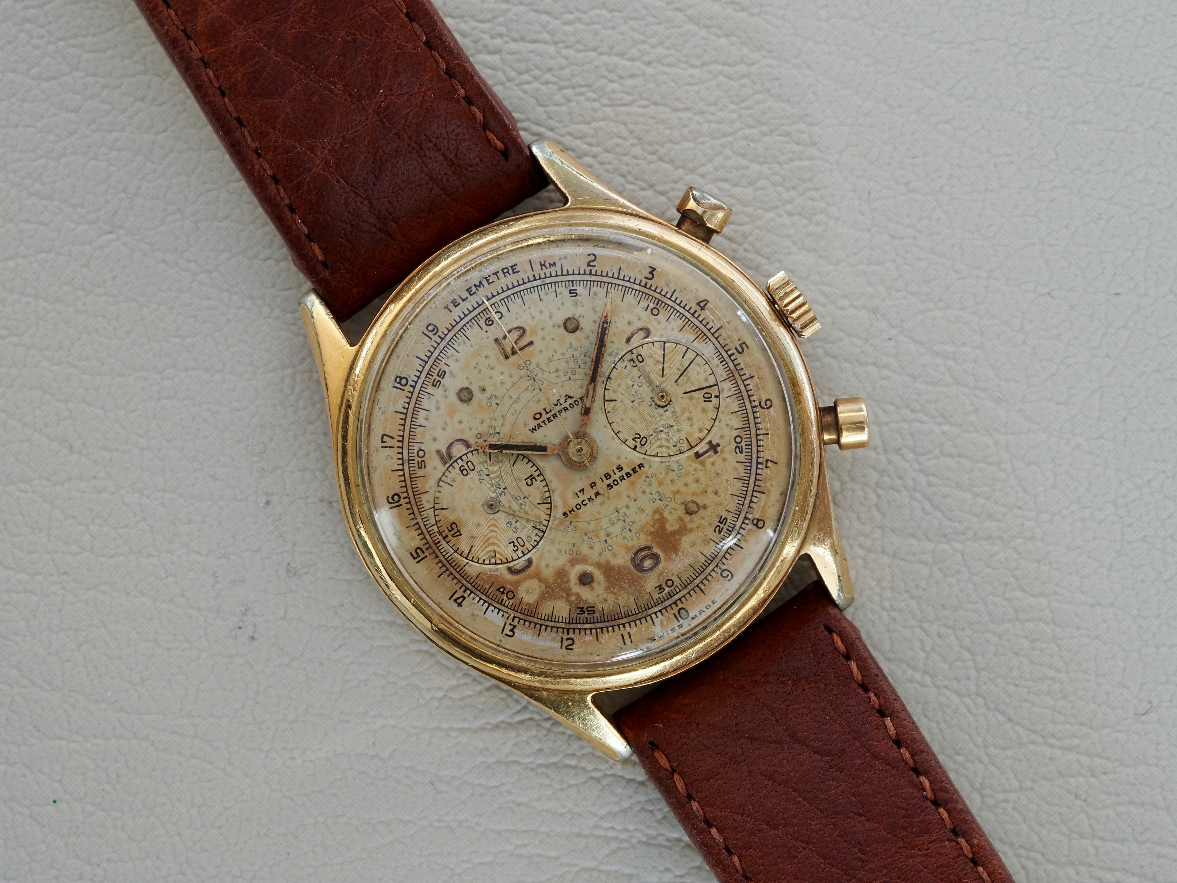 Montre vintage Olma Chronograph, pour homme, proposée par Maison Vintage Watches.
